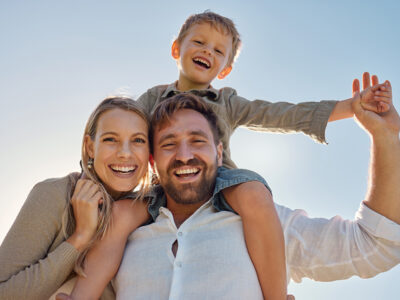 Family, mother and father with child, for holiday, vacation and being happy together outdoor